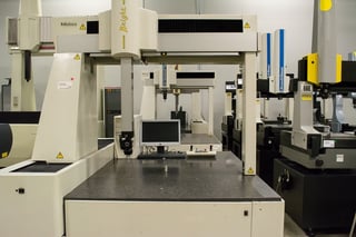 Used Mitutoyo Bright CMM with Renishaw PH10 Probe Head and monitor surrounded by Used Brown and Sharpe PFX454 CMm and Used Sheffield CMM Used Mitutoyo Bright CMM with Renishaw PH10 Probe Head and monitor surrounded by Used Brown and Sharpe PFX454 CMm and Used Sheffield CMM